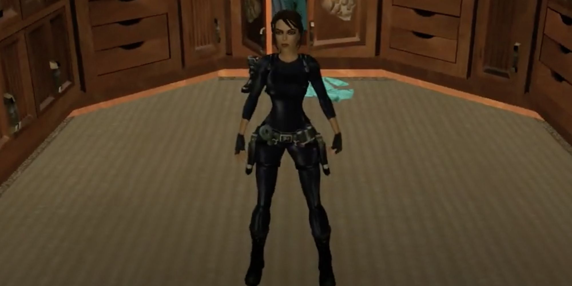 Lara donning the Catsuit outfit in Tomb Raider Legend.