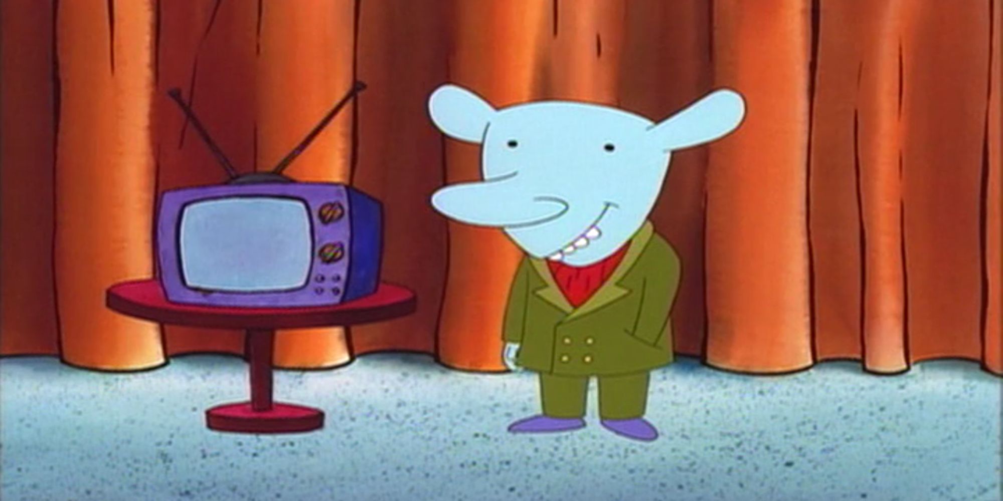Winslow from CatDog standing next to a small TV and wearing a green suit