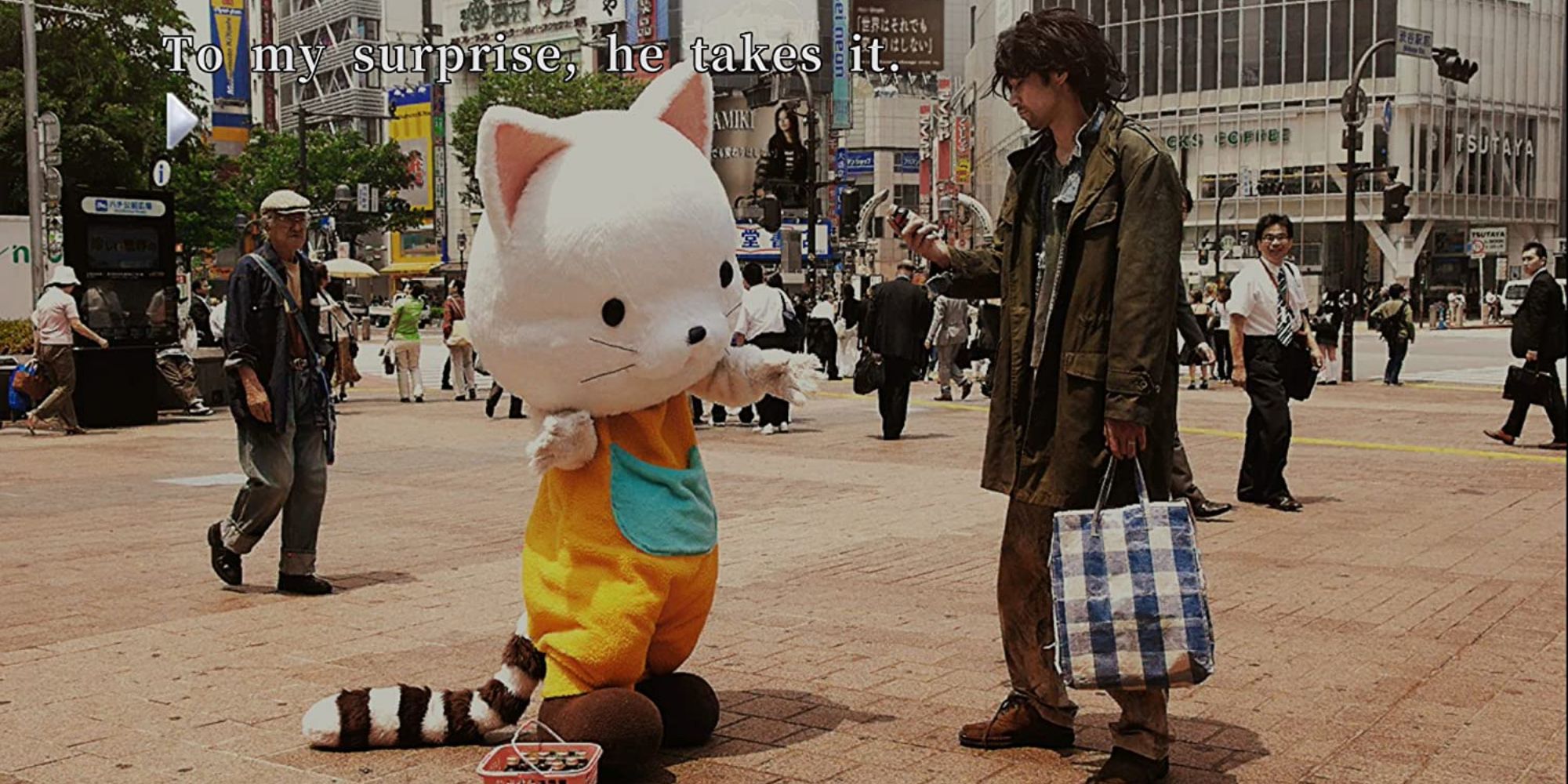 428: Shibuya Scramble wide shot of man in cat costume talking to homeless man on the busy Shibuya Crossing