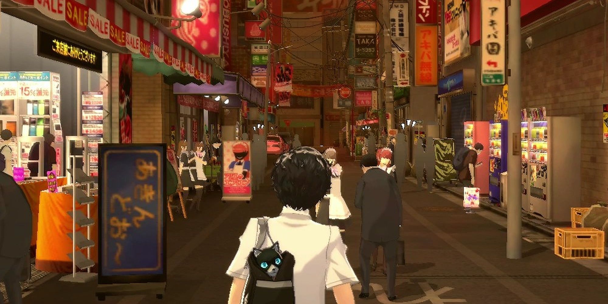 Joker and Morgana in Akihabara, Japan, as it appears in Persona 5.