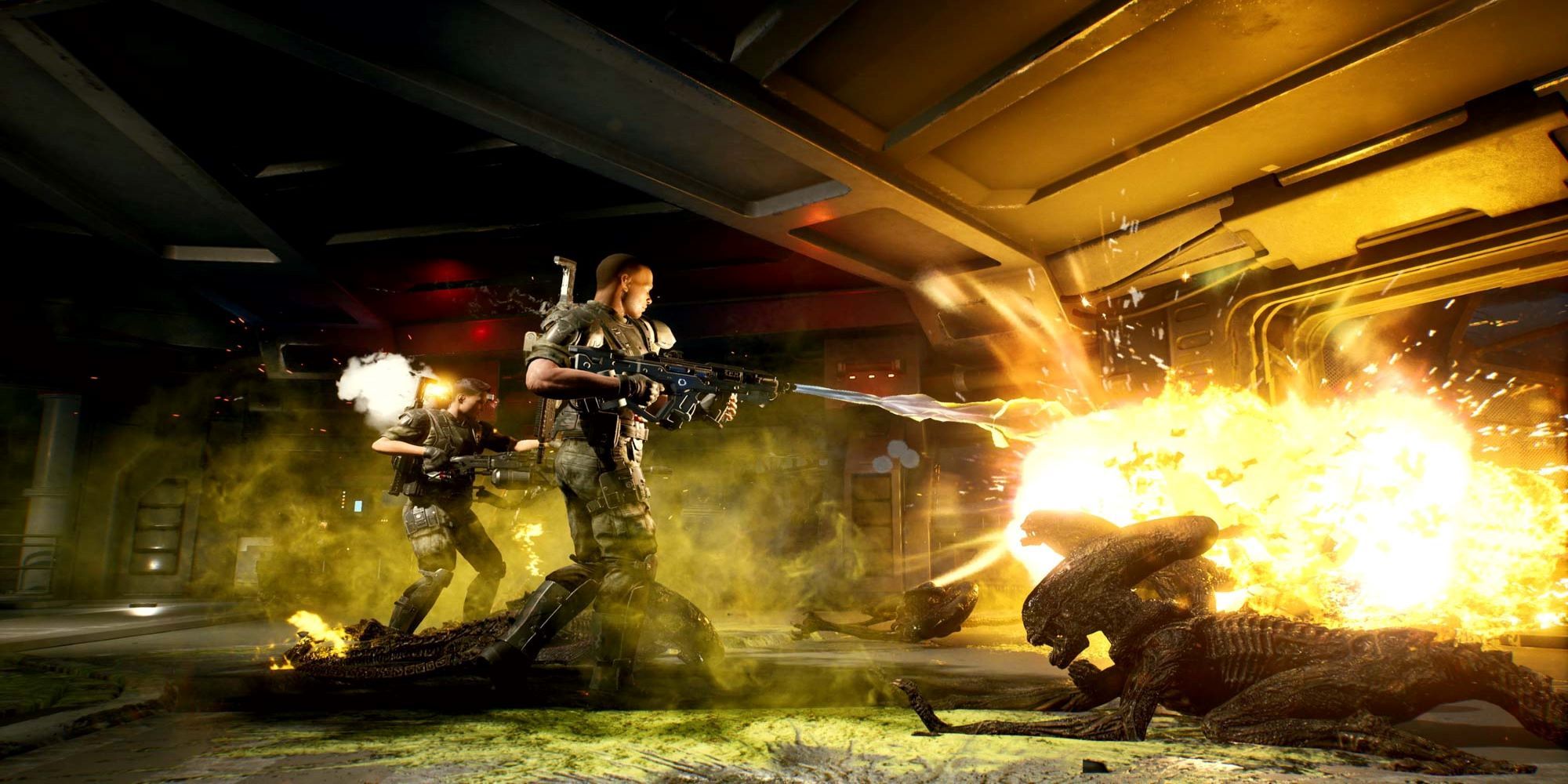 A Demolisher clears the room with a flamethrower in Aliens: Fireteam Elite