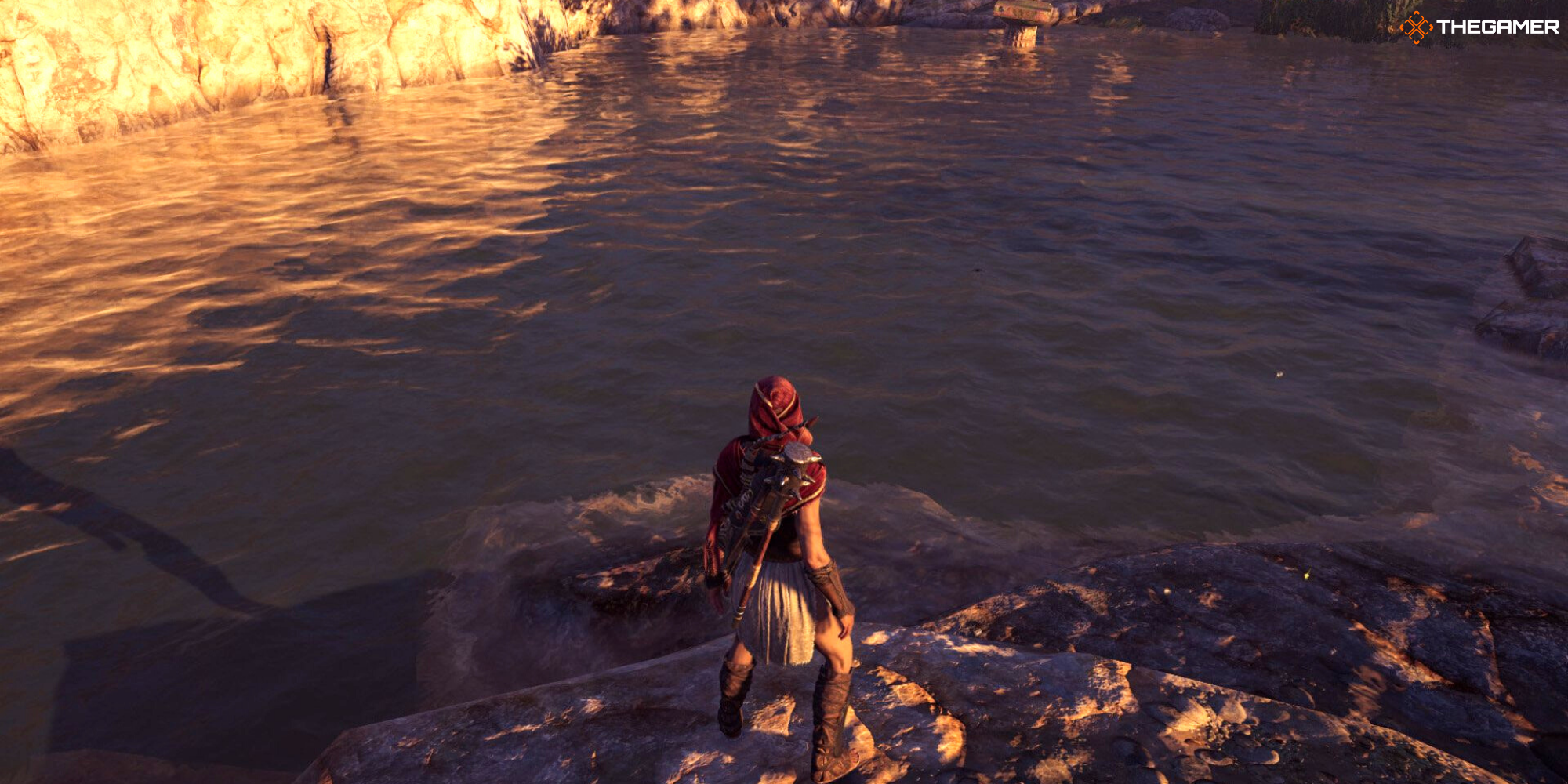 Assassin's Creed Odyssey - Kassandra overlooking a body of water