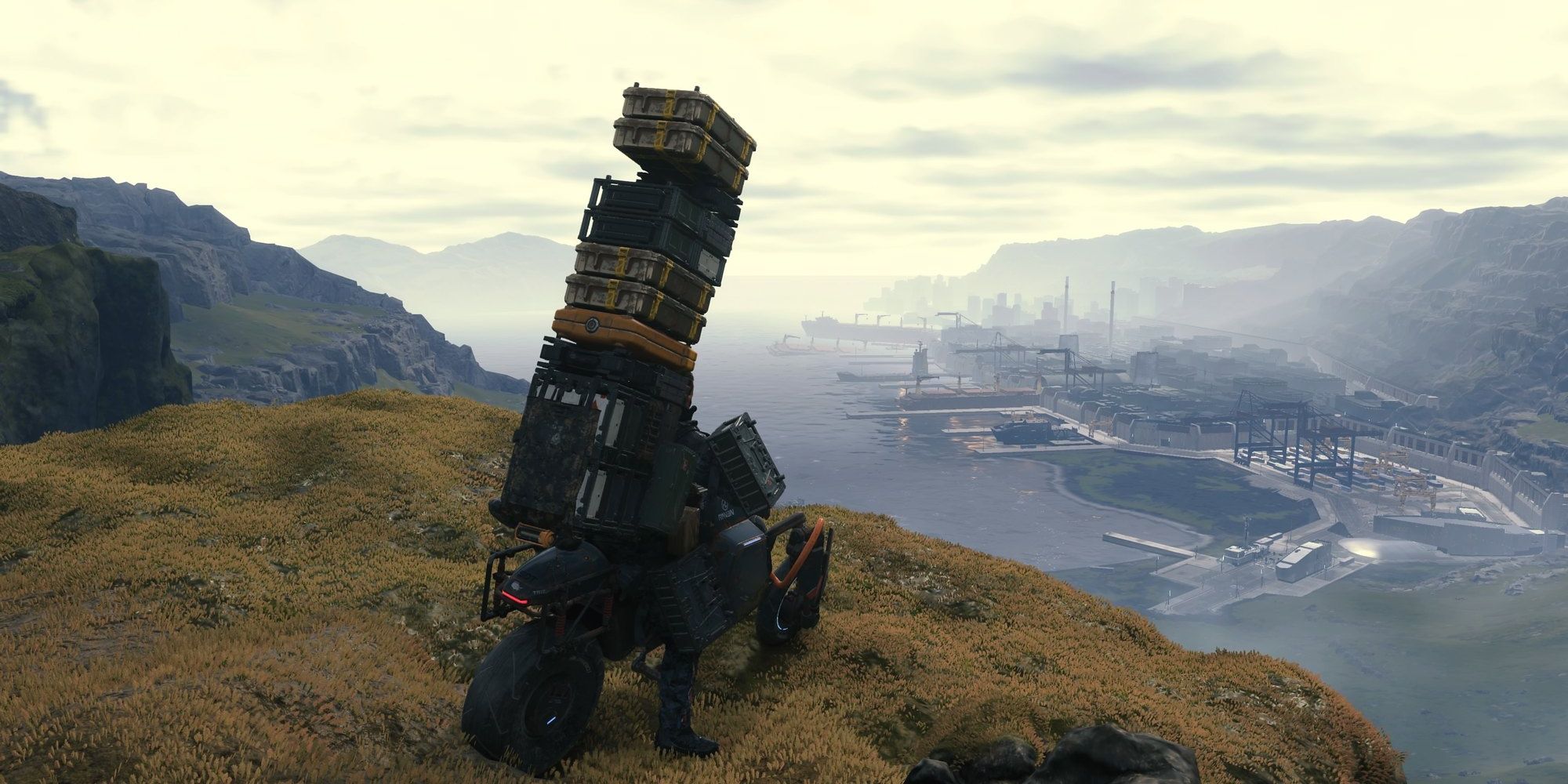 Sam on the reverse trike on a hill overlooking Port Knot City with lots of cargo on his back