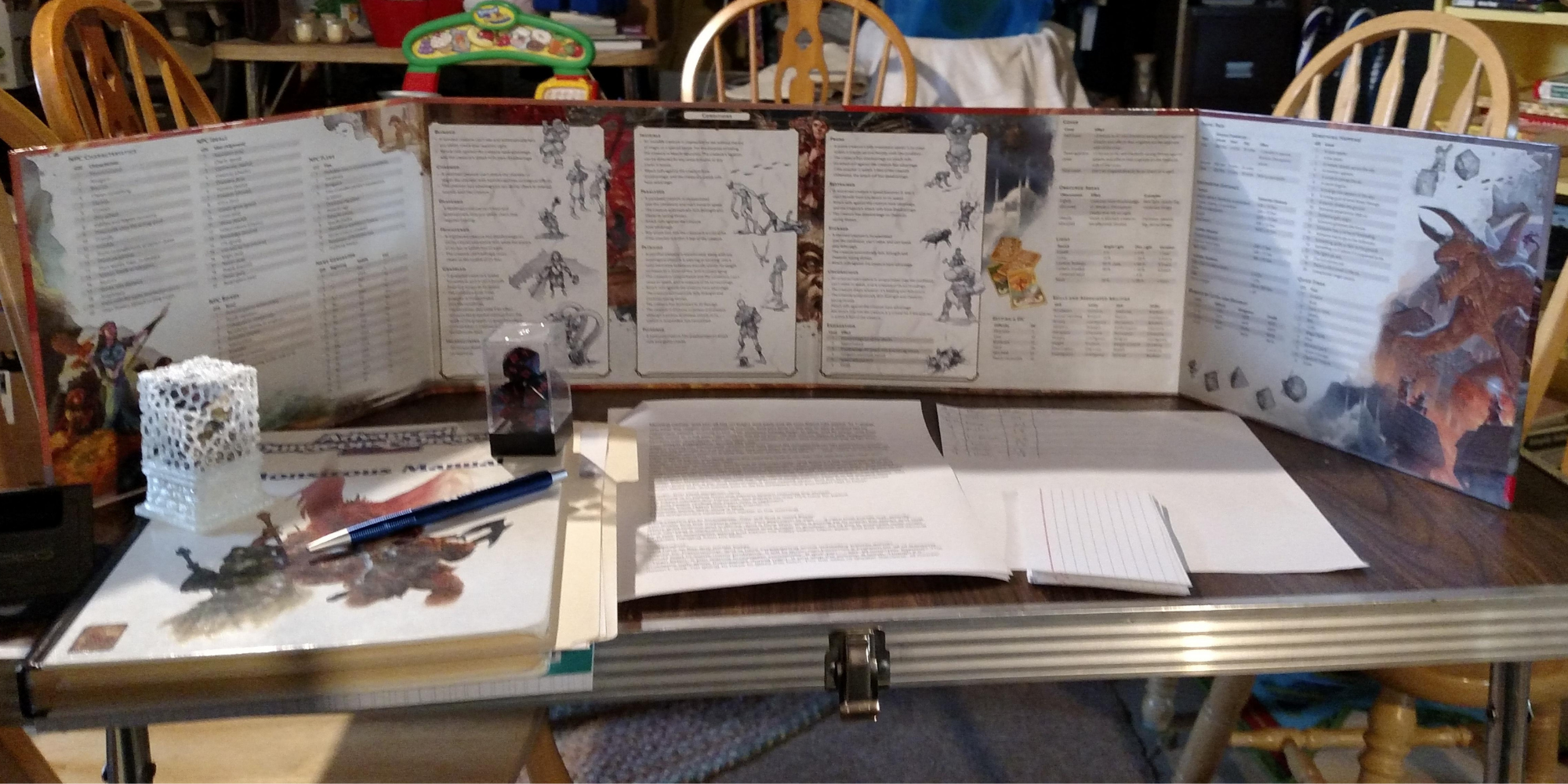 Dungeons and Dragons (dnd) - DM screen with notes in front of it