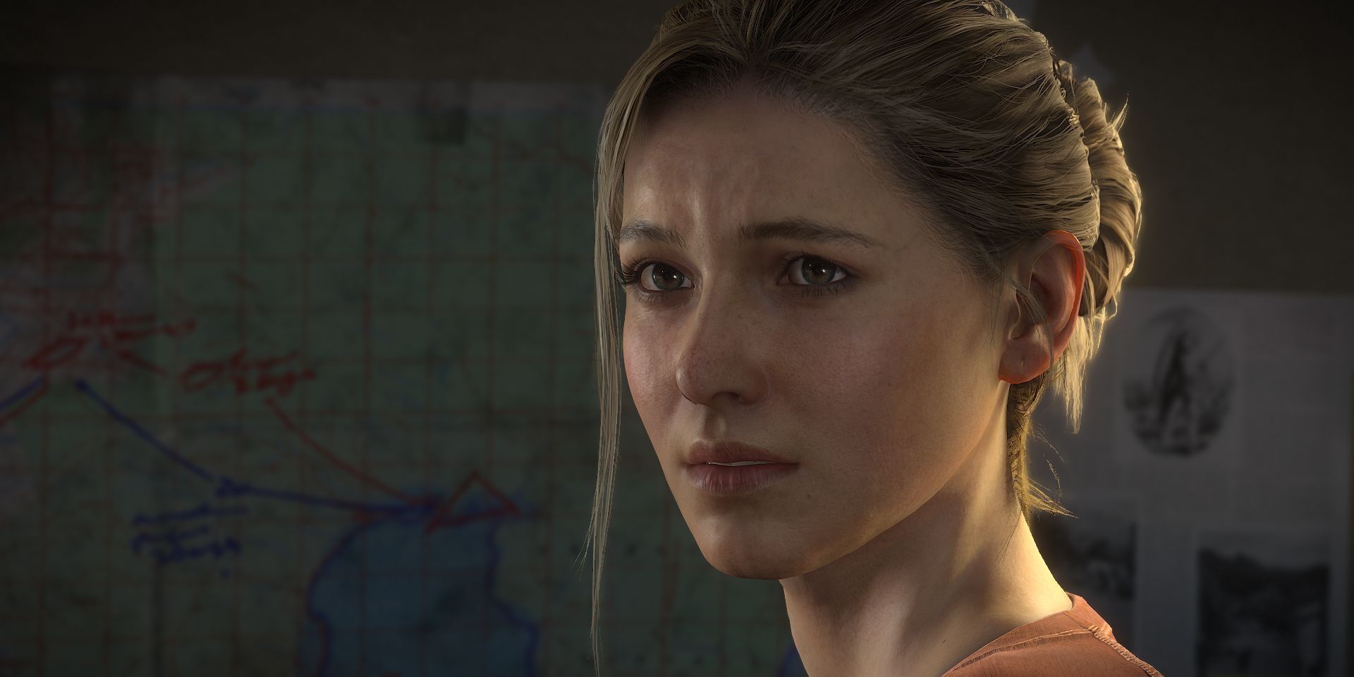 Elena Fisher from Uncharted 4 stares off-screen sadly