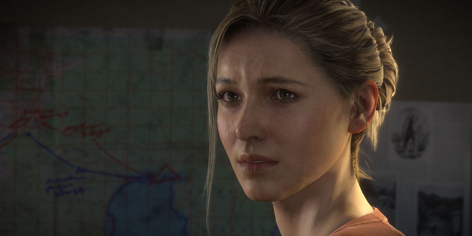 Elena Fisher from Uncharted 4 stares off-screen sadly.