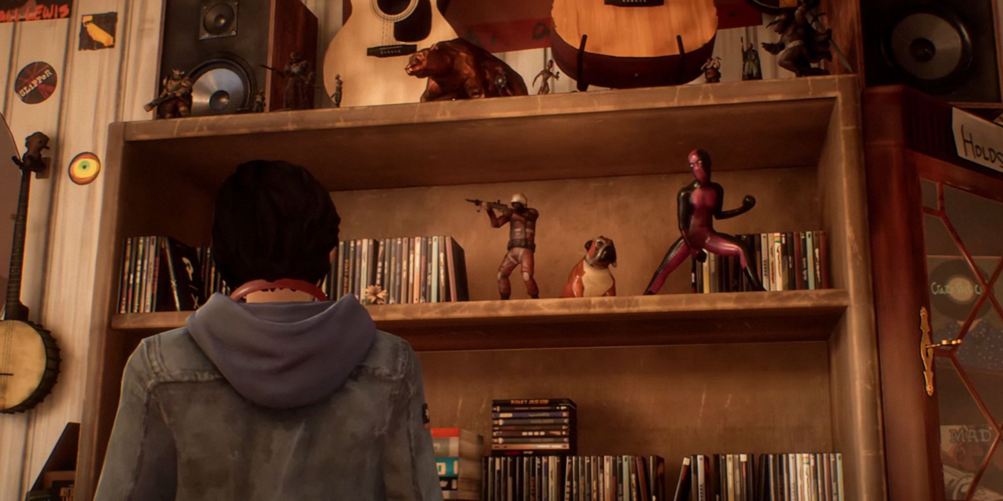 Alex Chen from Life Is Strange: True Colors, looking at music memorabilia 