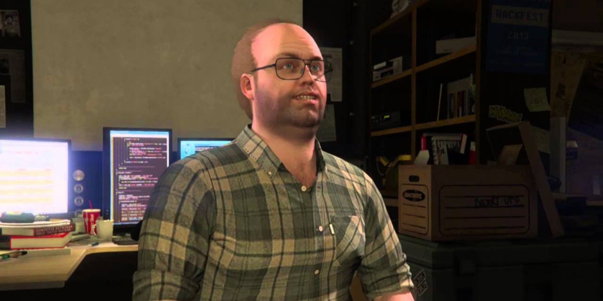 GTAV lester crest smiling up from his computer desk