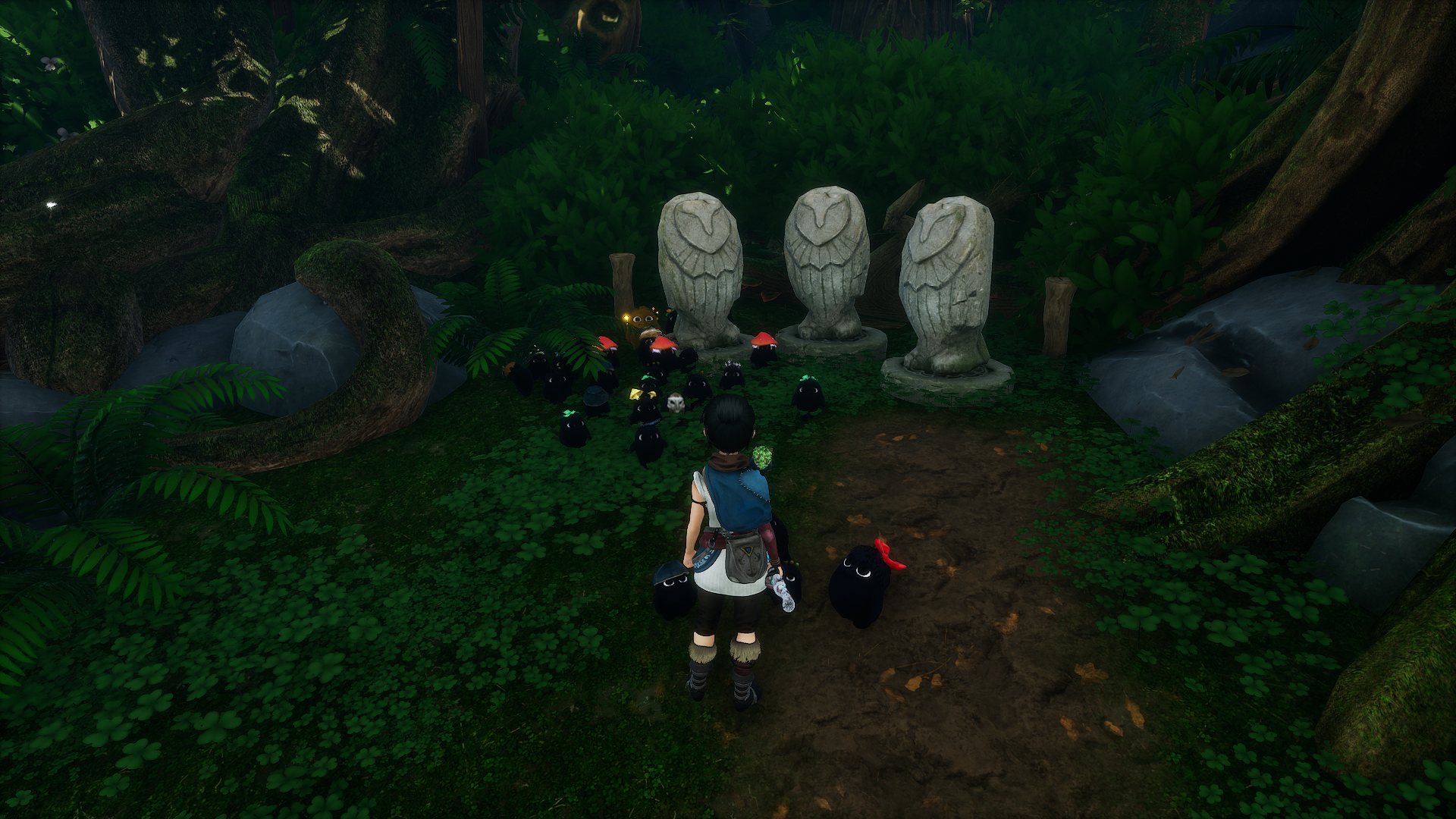 Kena standing in front of three owl statues and a bunch of Rots
