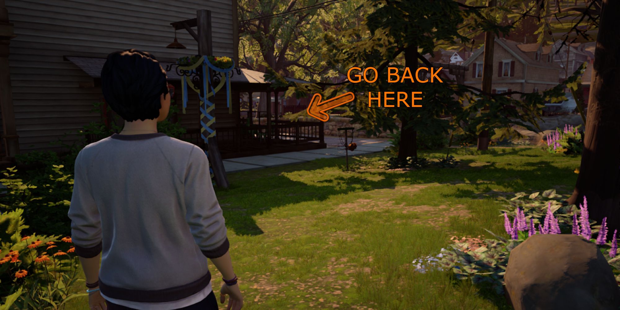 Life is Strange True Colors Screenshot Of Alex In the Park Looking At The Back Of The Diner