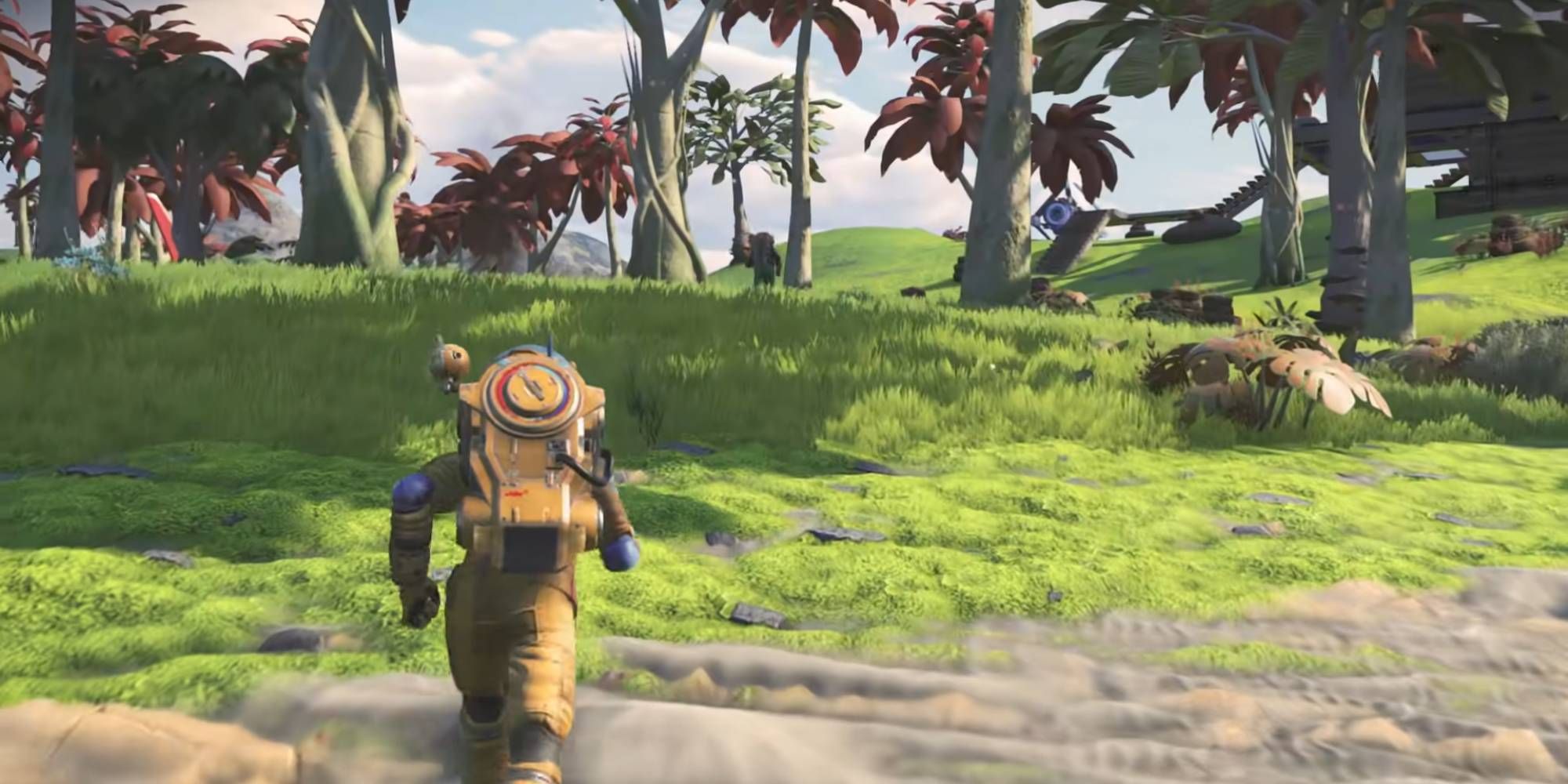 No Man's Sky wide angle screenshot of spaceman running across grass