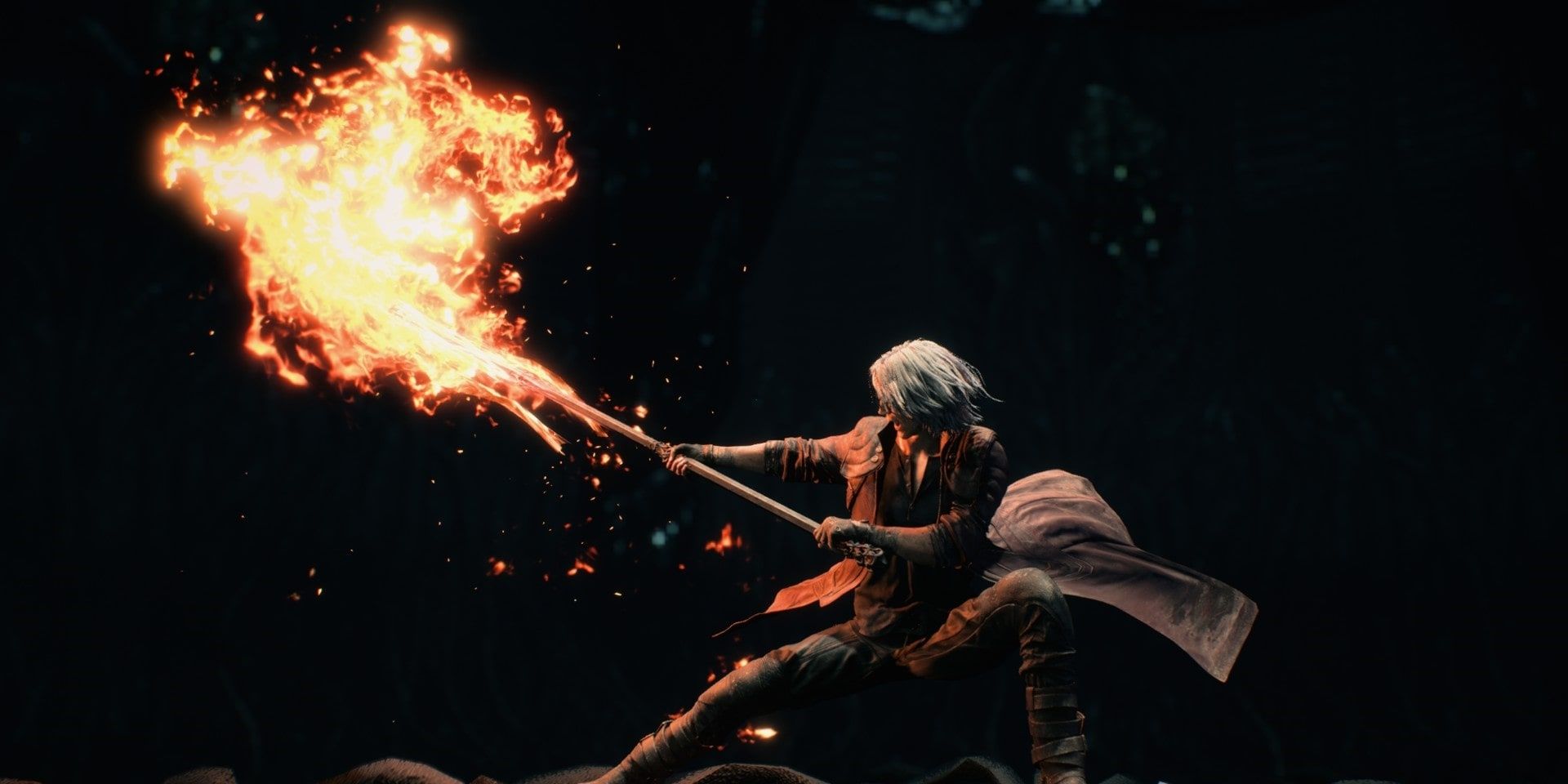 Dante using King Cerberus in its fire bo staff form