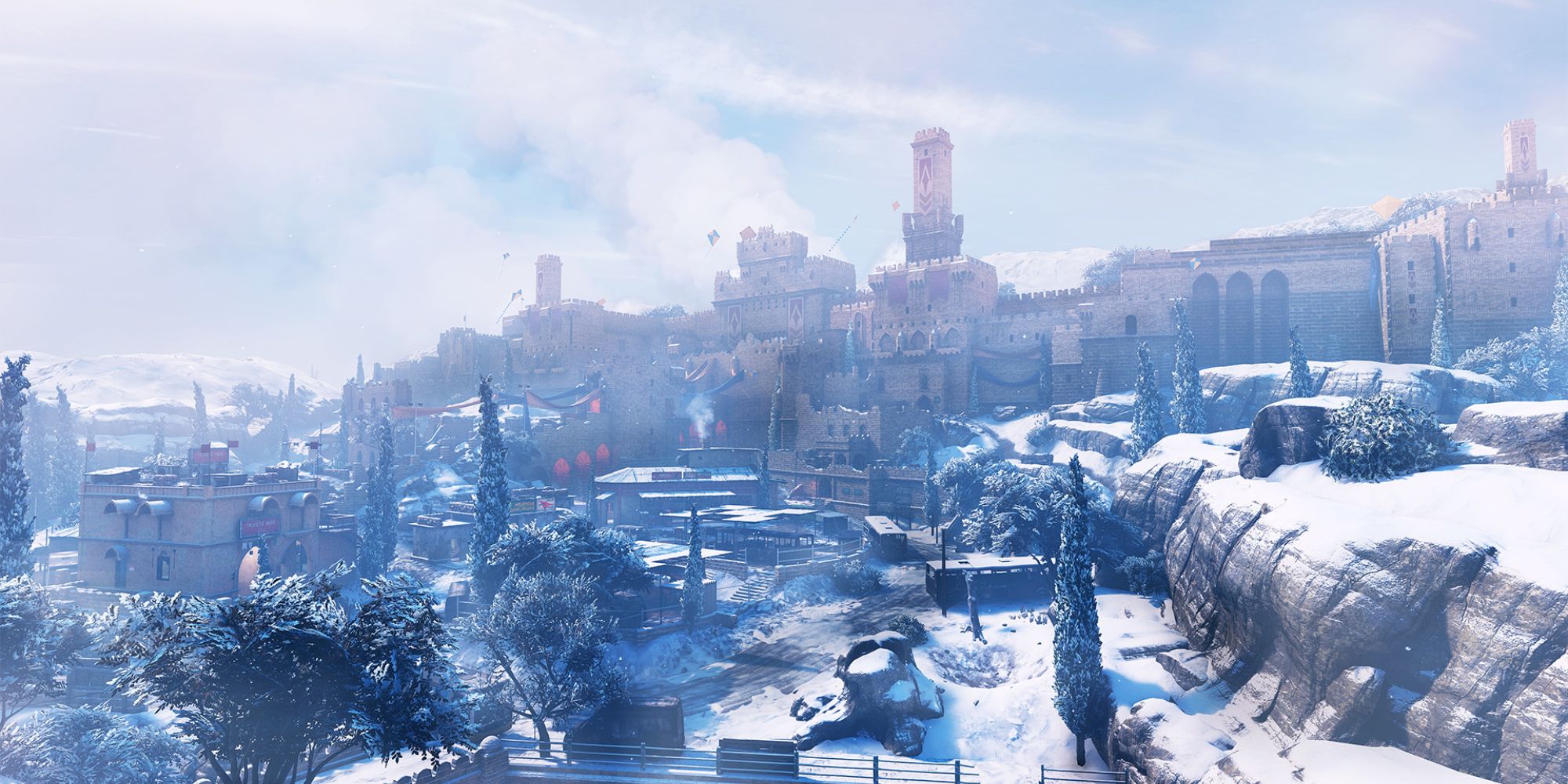 Insurgency Sandstorm Maps an extreme wide shot of the map Bab with a red-stone fortress sitting atop a cliff with a small snow-covered town beneath it