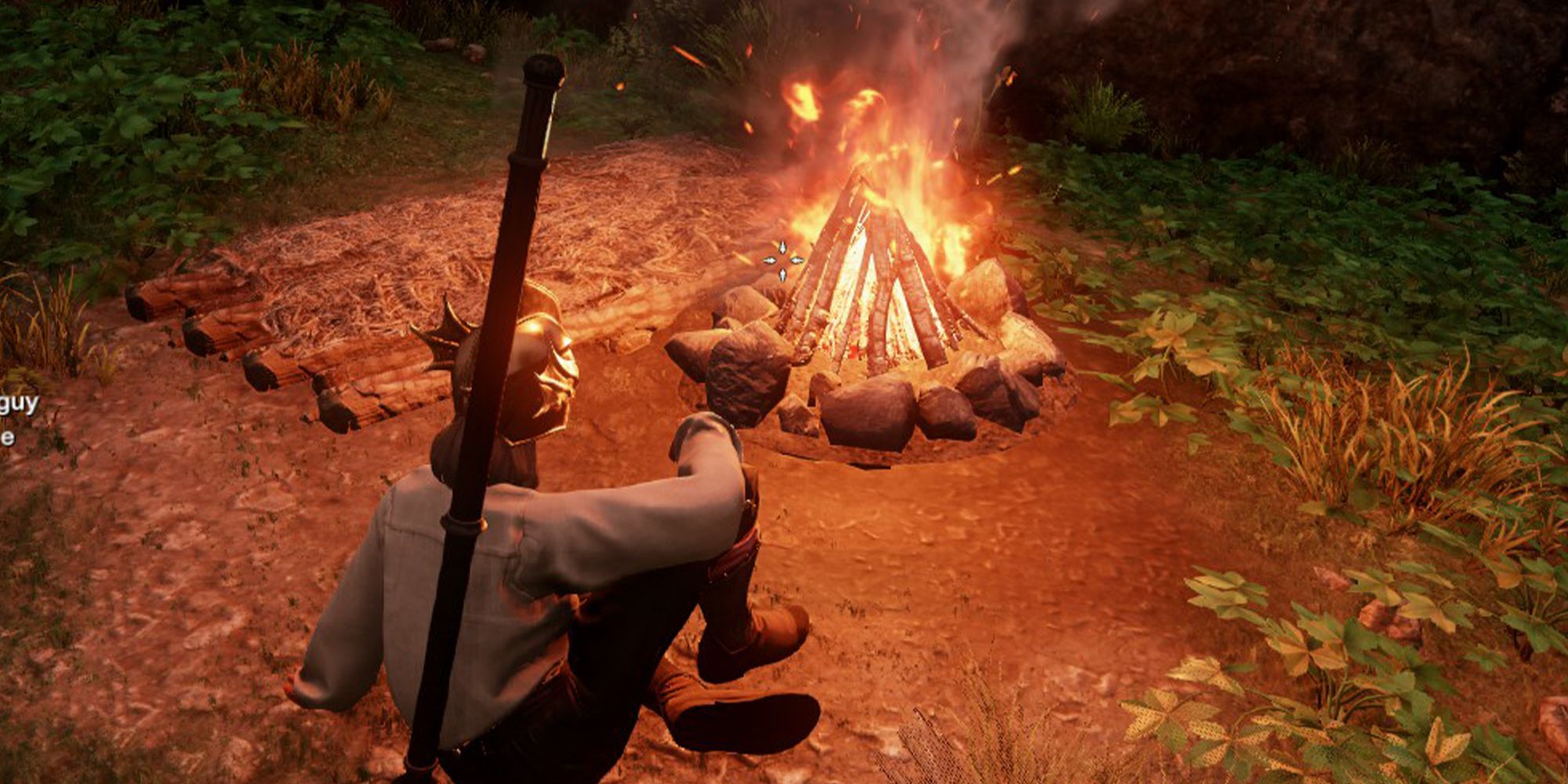 New World woman sitting by a campfire 