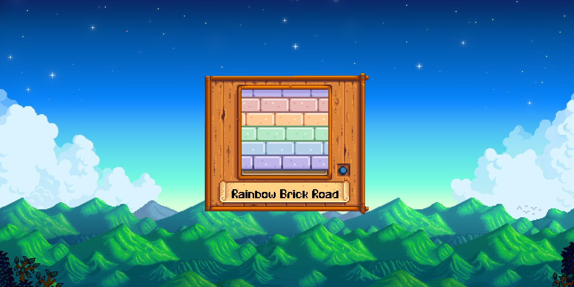 Picture of wallpaper with pastel rainbow bricks, with the Stardew Valley mountains in the background