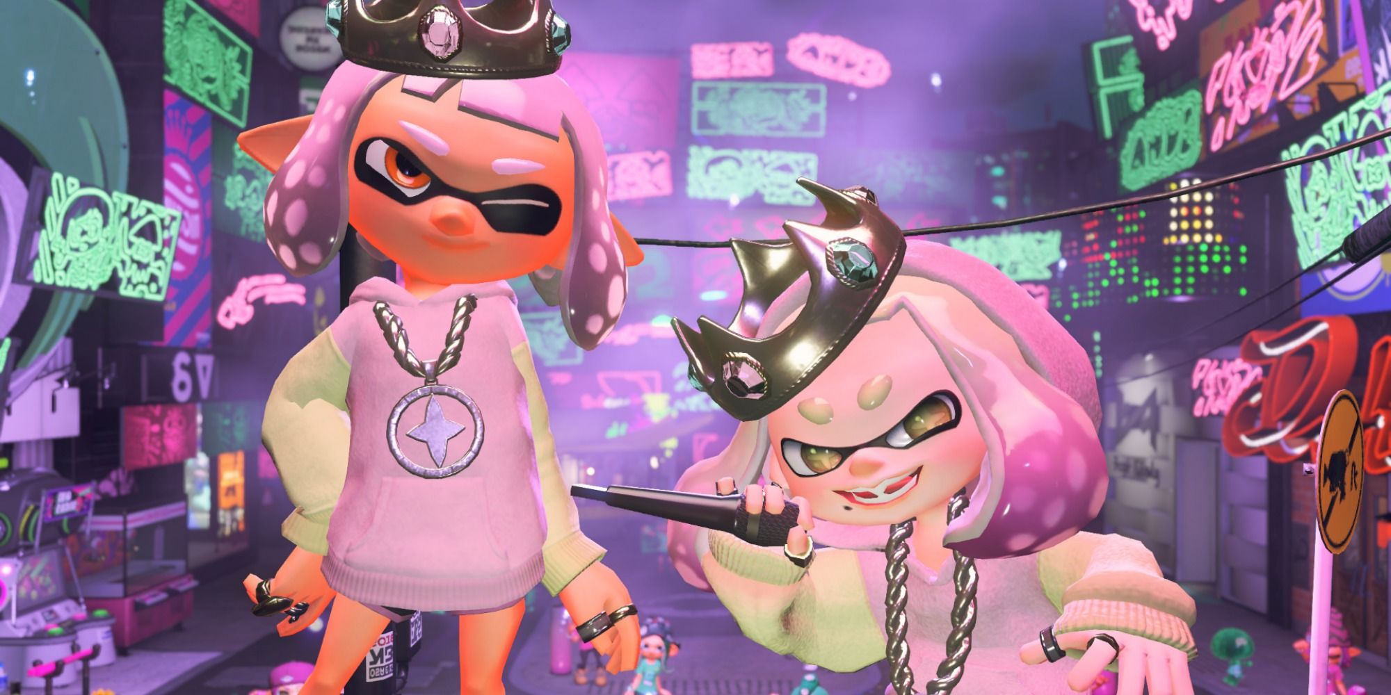 Pink-haired Inkling stands next to Pearl, both earing the Pearlescent Hoodie in a club