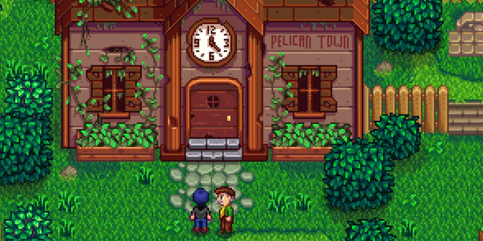 player and mayor lewis standing outside community center