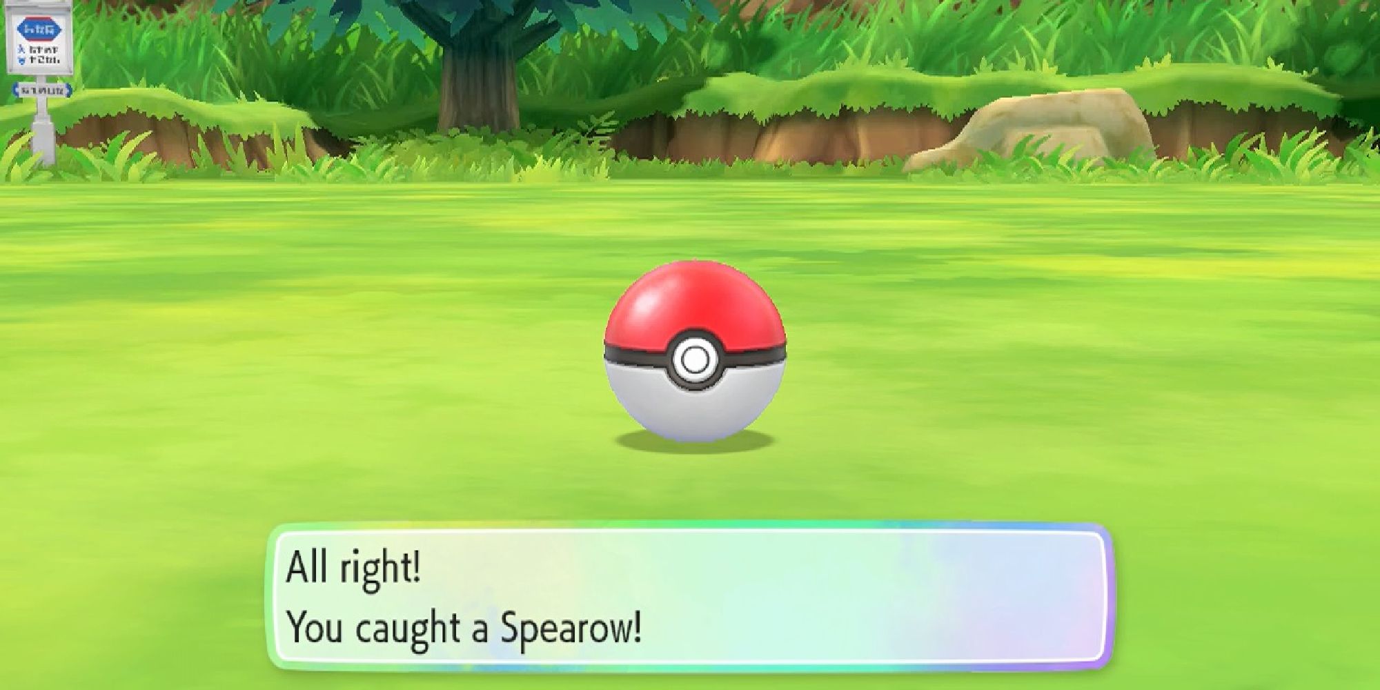 Video Game Sound Effects a wide shot of a PokeBall from Pokemon sat in a grassy field surrounded by trees and a sign off to the left with a text box beneath it 