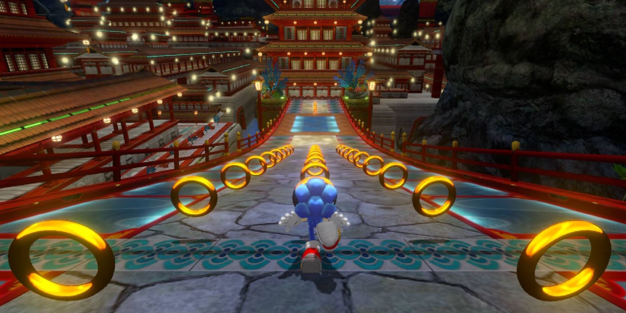 Video Game Sound Effects a wide angle shot of Sonic the Hedgehog running down a steep hill toward Japanese-style buildings with lanes of coins in front of him and to the left and right