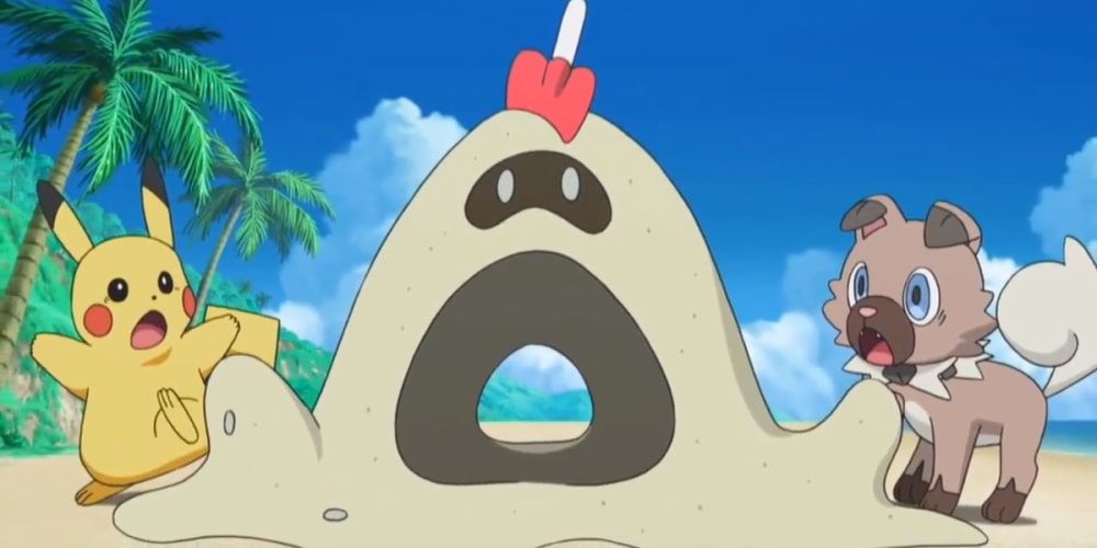 Sandygast jumps out and scares Pikachu and Rockruff in the Pokemon Sun and Moon Anime.