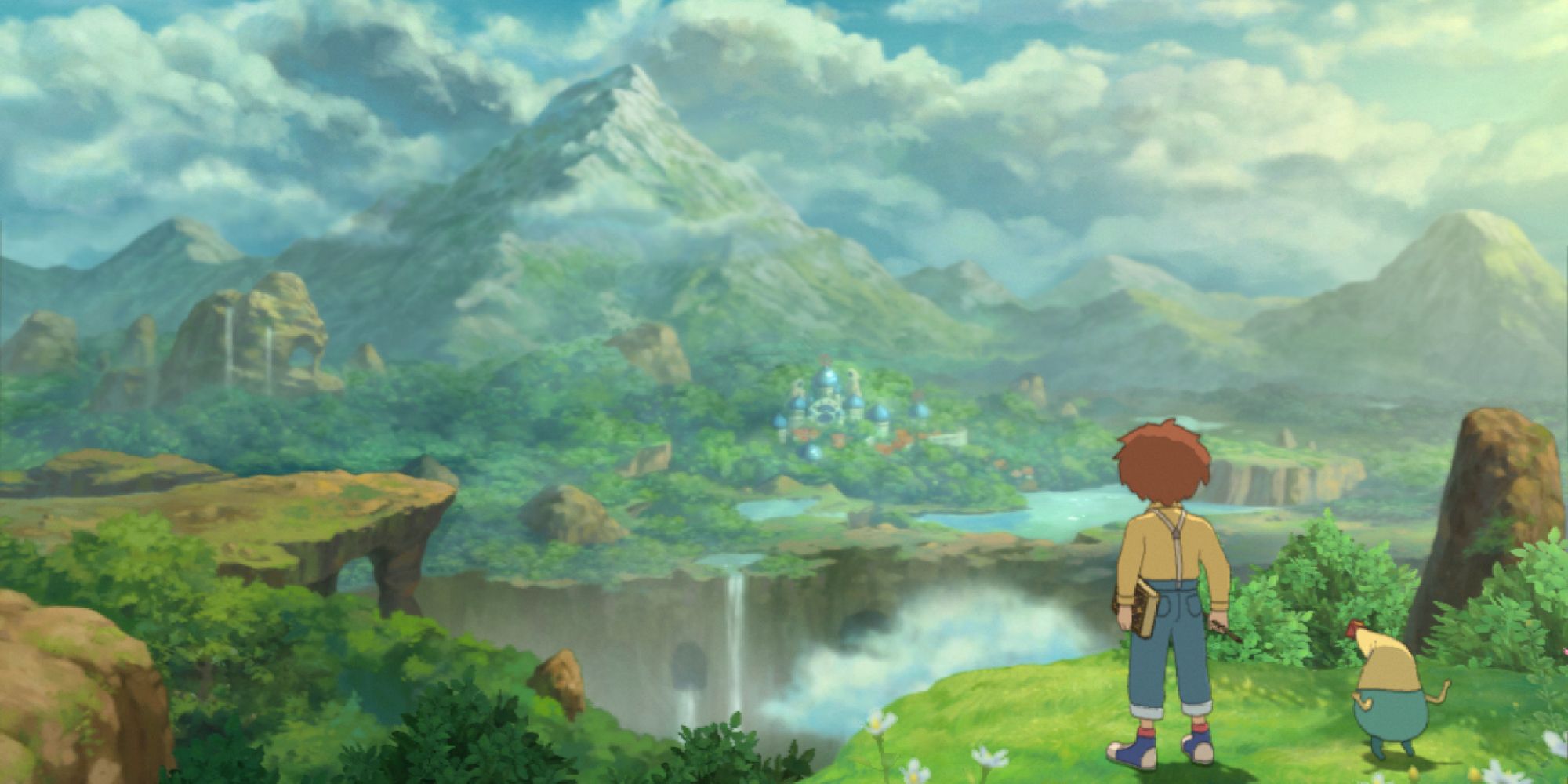 Awide shot of Oliver and Drippy from Ni No Kuni Wrath Of The White Witch on a cliffside overlooking a verdant landscape and the city of Ding Dong Dell in the far distance