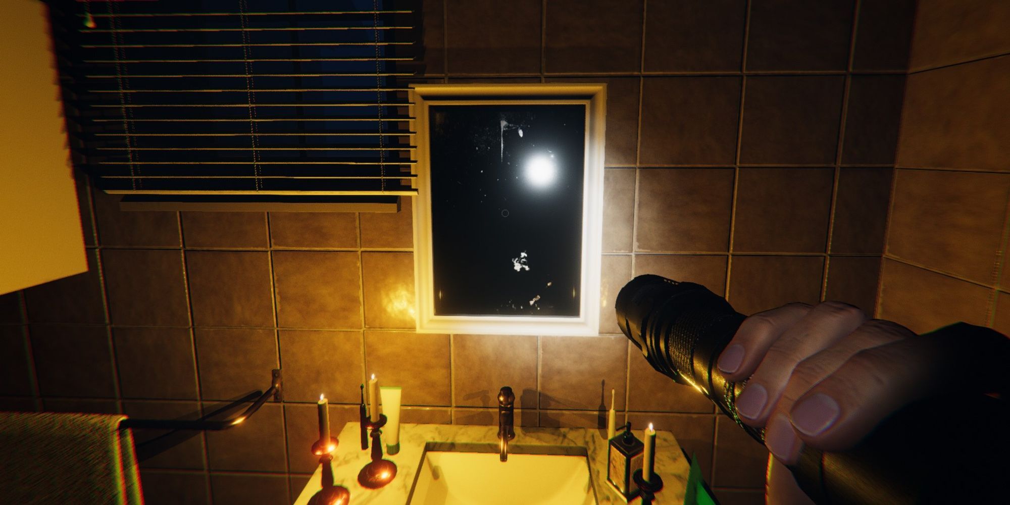 player aims a flashlight at a Bathroom Mirror in Phasmophobia Lit by candles