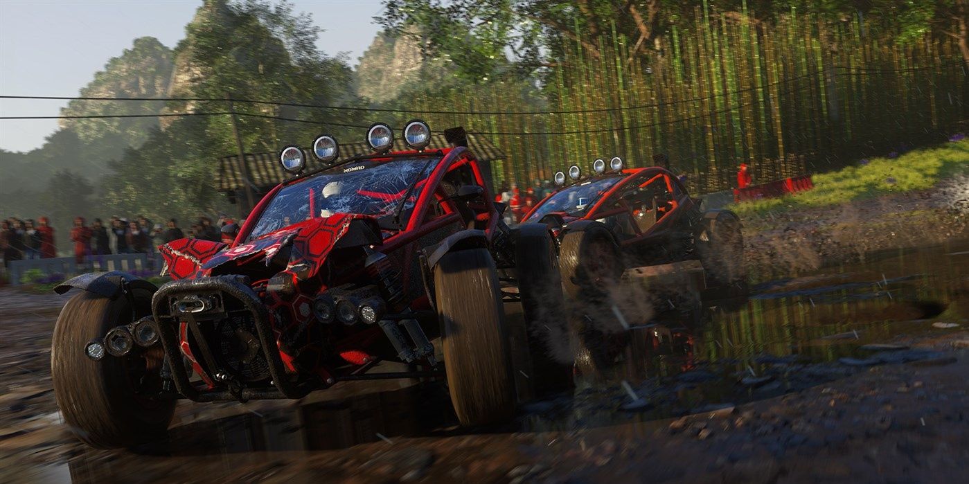 Dirt 5 Two buggies driving round a muddy track