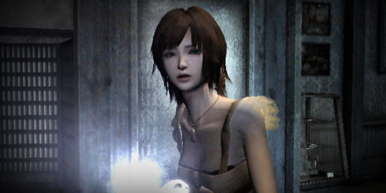 Fatal Frame 4 protagonist hunched over with a flashlight