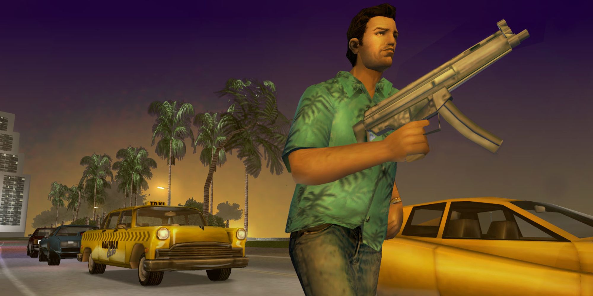 Games With Short Development Times a mid shot of Tommy Vercetti from GTA Vice City running down a road with a submachine gun with palm trees, taxis and other cars behind him