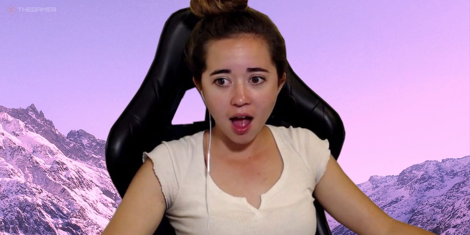 Twitch streamer Maya in a white tee with a shocked expression on her face