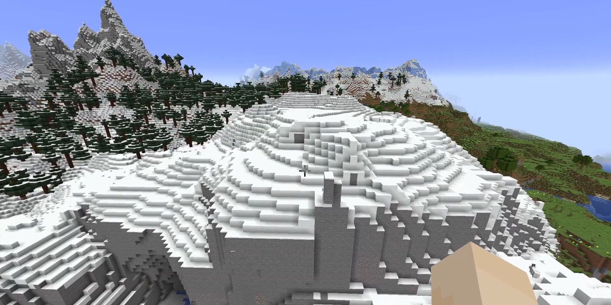 player viewing snowy slopes biome from creative mode