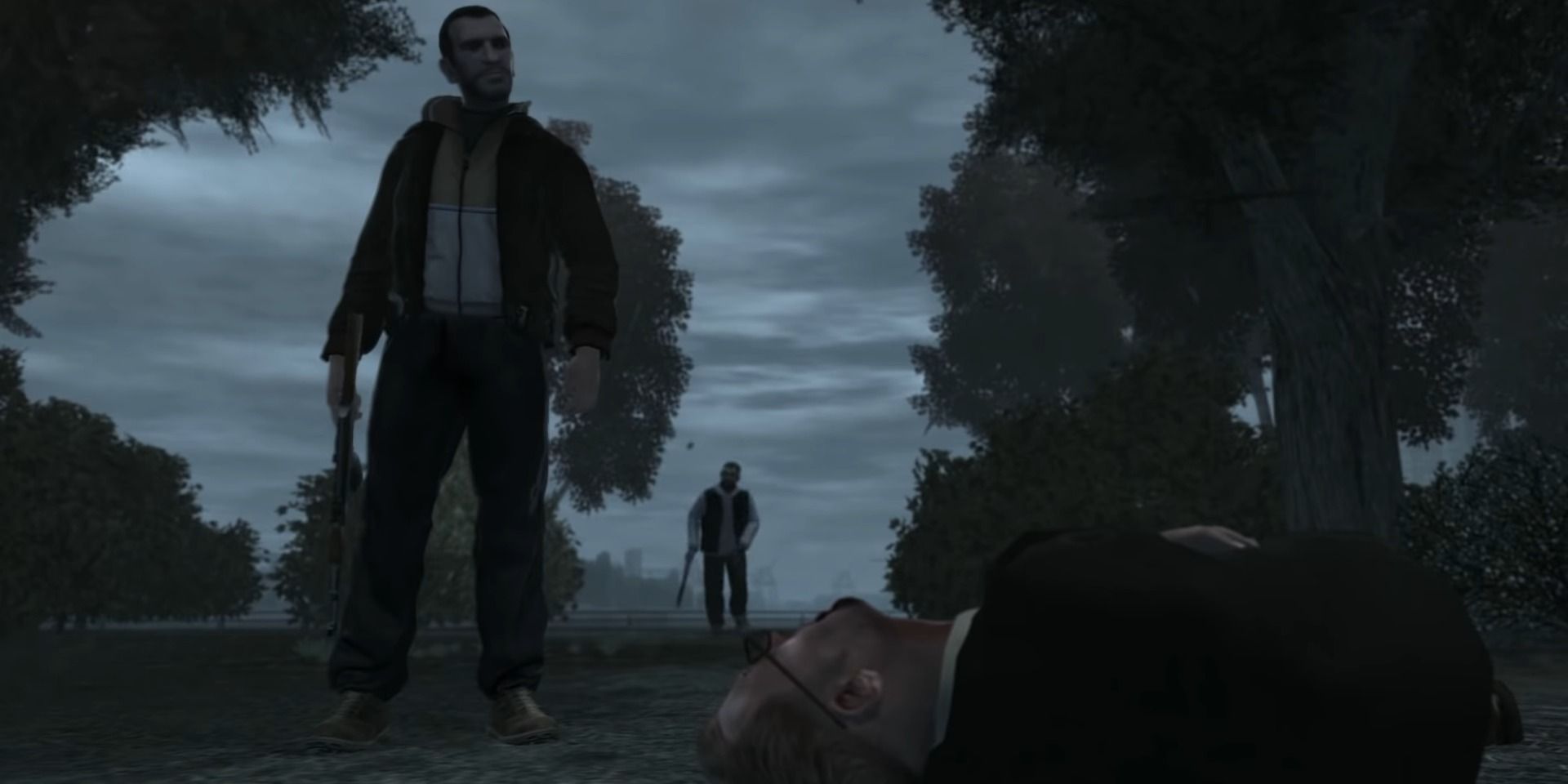 A screenshot showing Niko standing over Dimitri's body in Grand Theft Auto 4