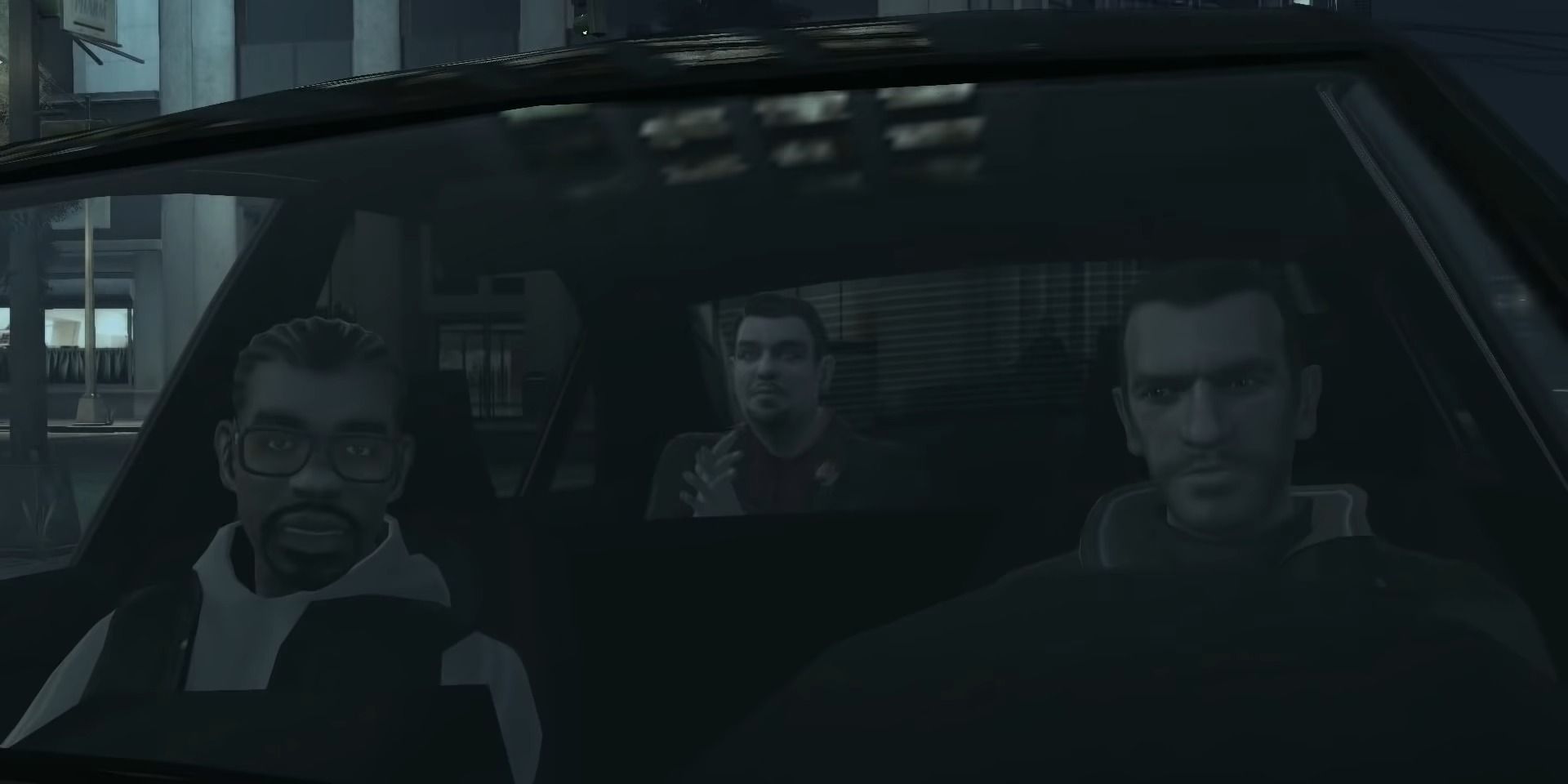 A screenshot showing Niko, Jacob and Roman in a car in Grand Theft Auto 4.