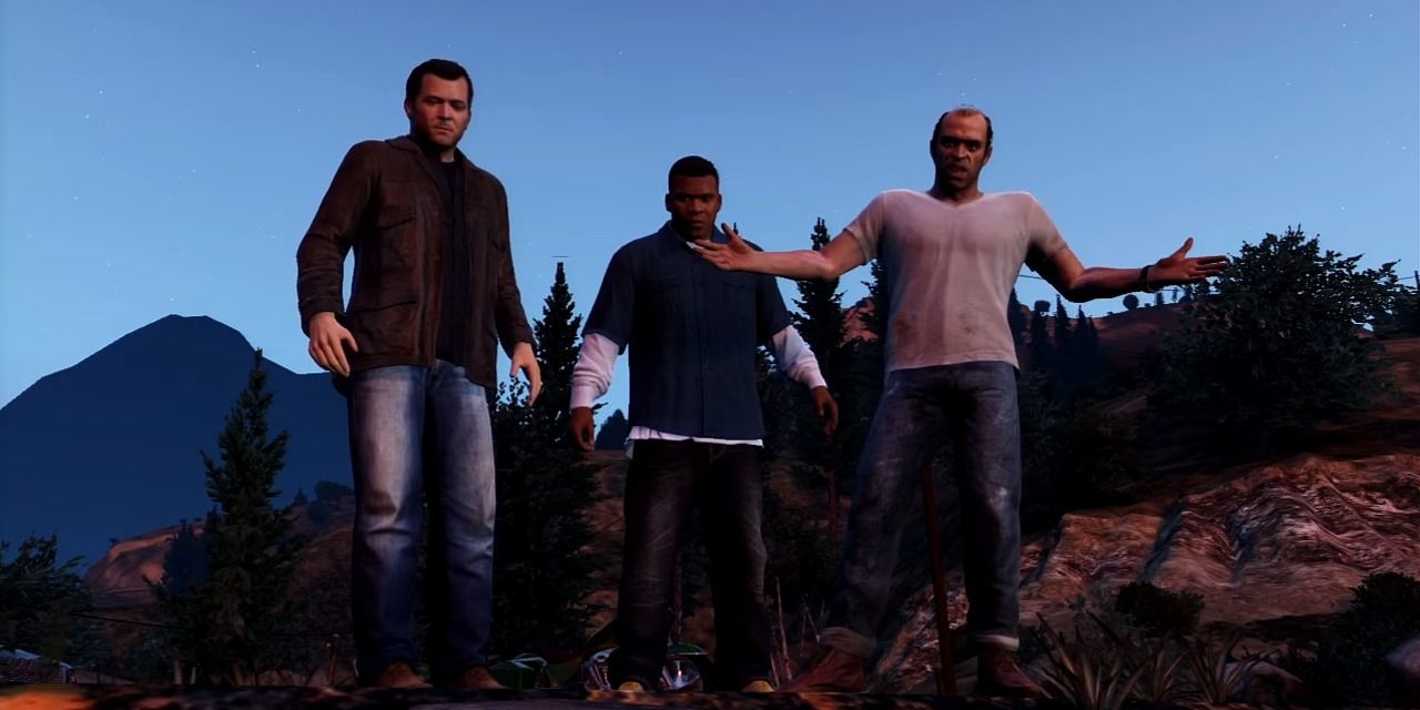Michael, Franklin and Trevor standing at the edge of a cliff in Grand Theft Auto 5