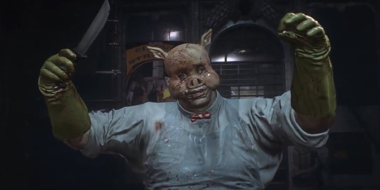 Professor Pyg holding up his arms with a knife in one