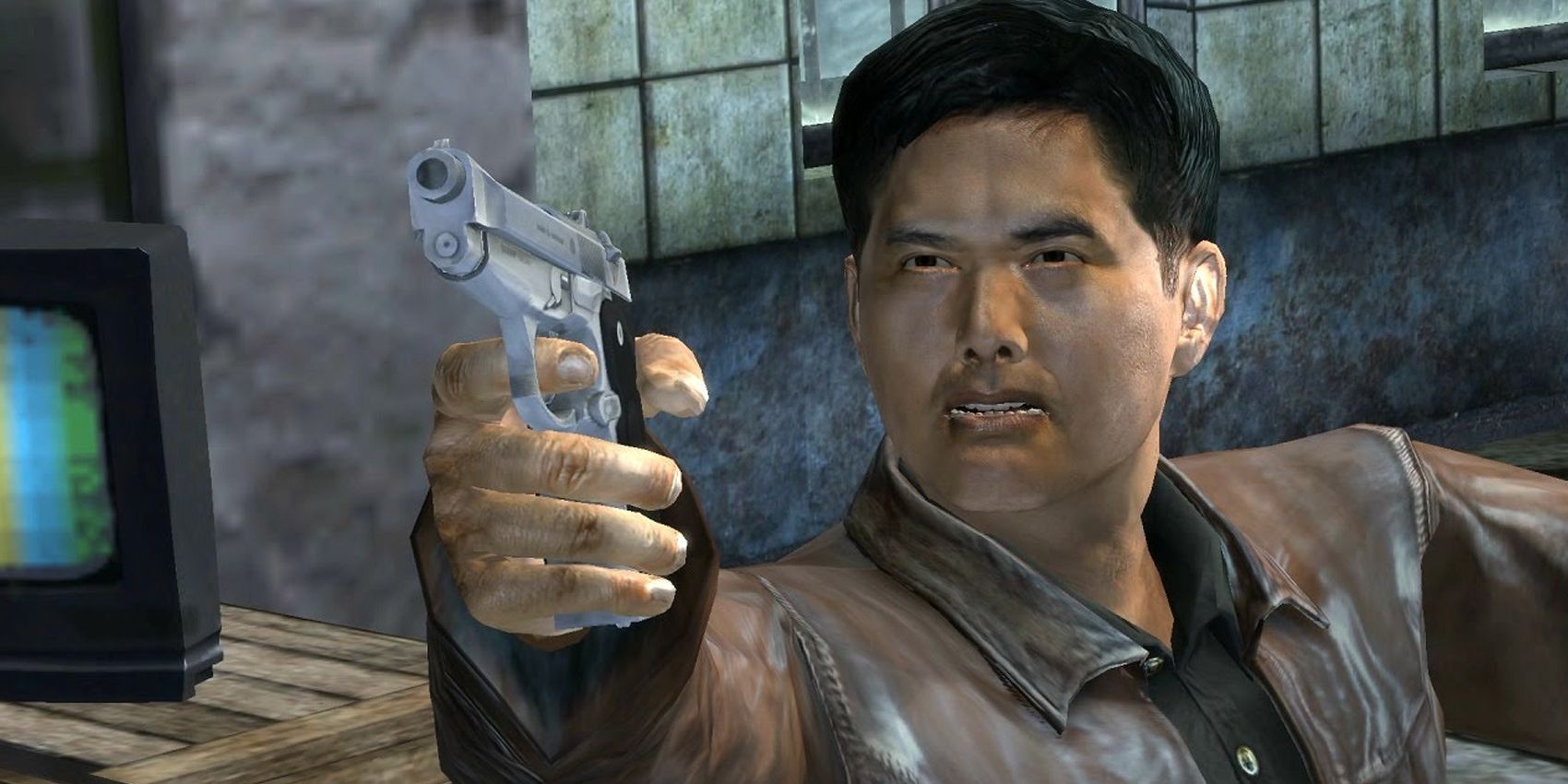 Chow-Yun Fat pointing a gun in Stranglehold