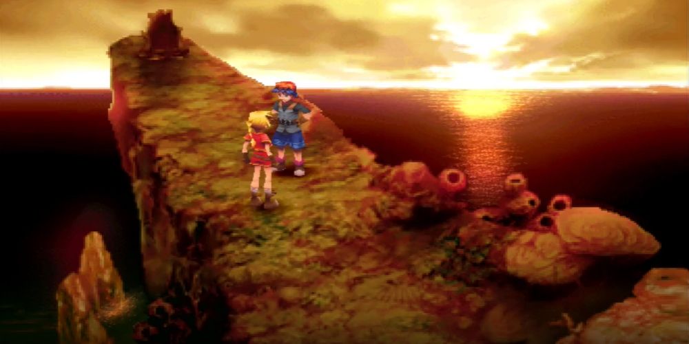 Chrono Cross, Kid and Serge on a cliff with the sun setting in the distance