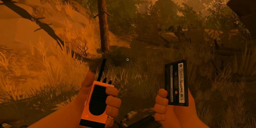 Firewatch: Henry holding a cassette that contains the song Ol' Shoshone
