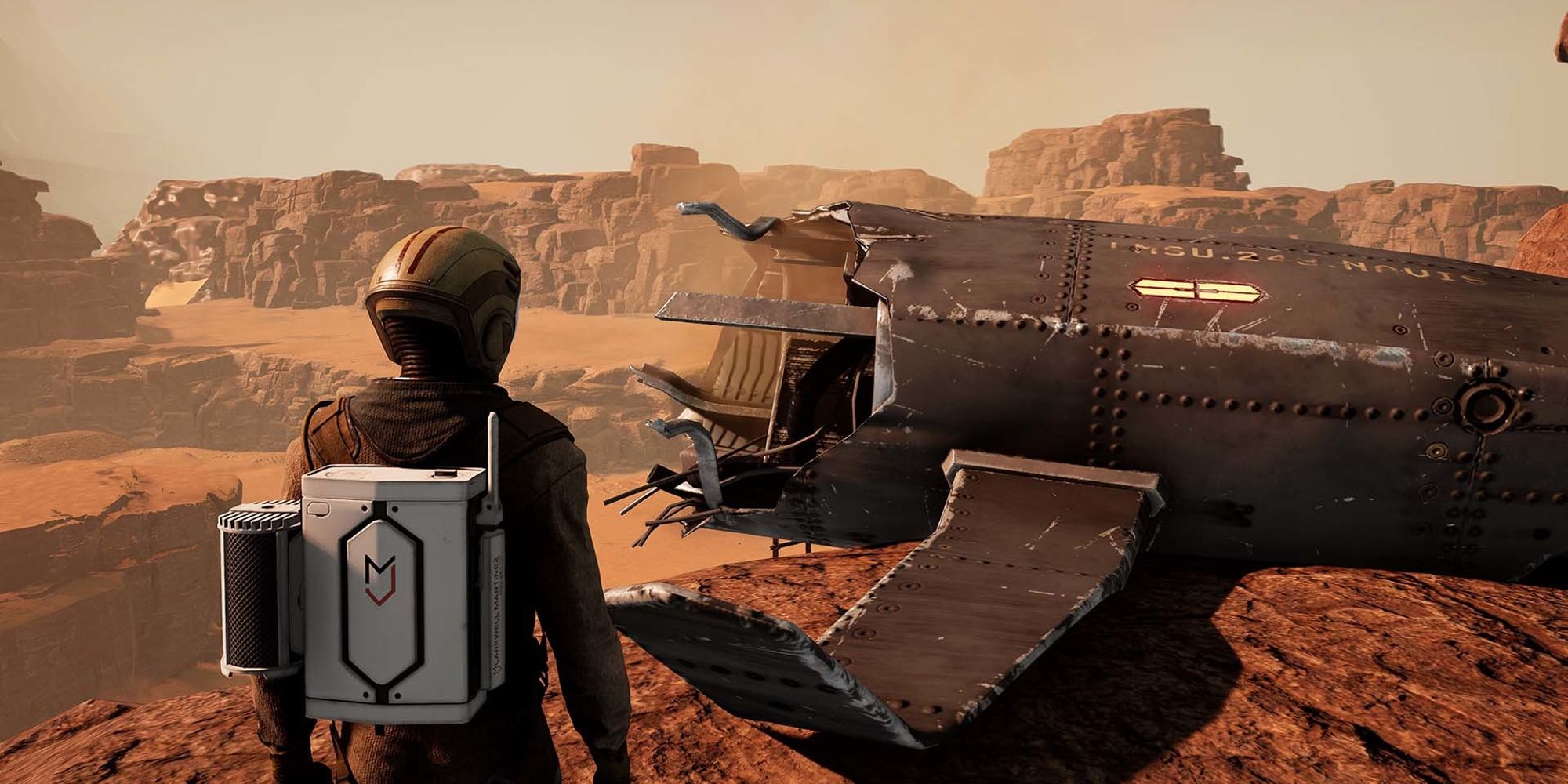 player in desert looking towards an abandoned ship part