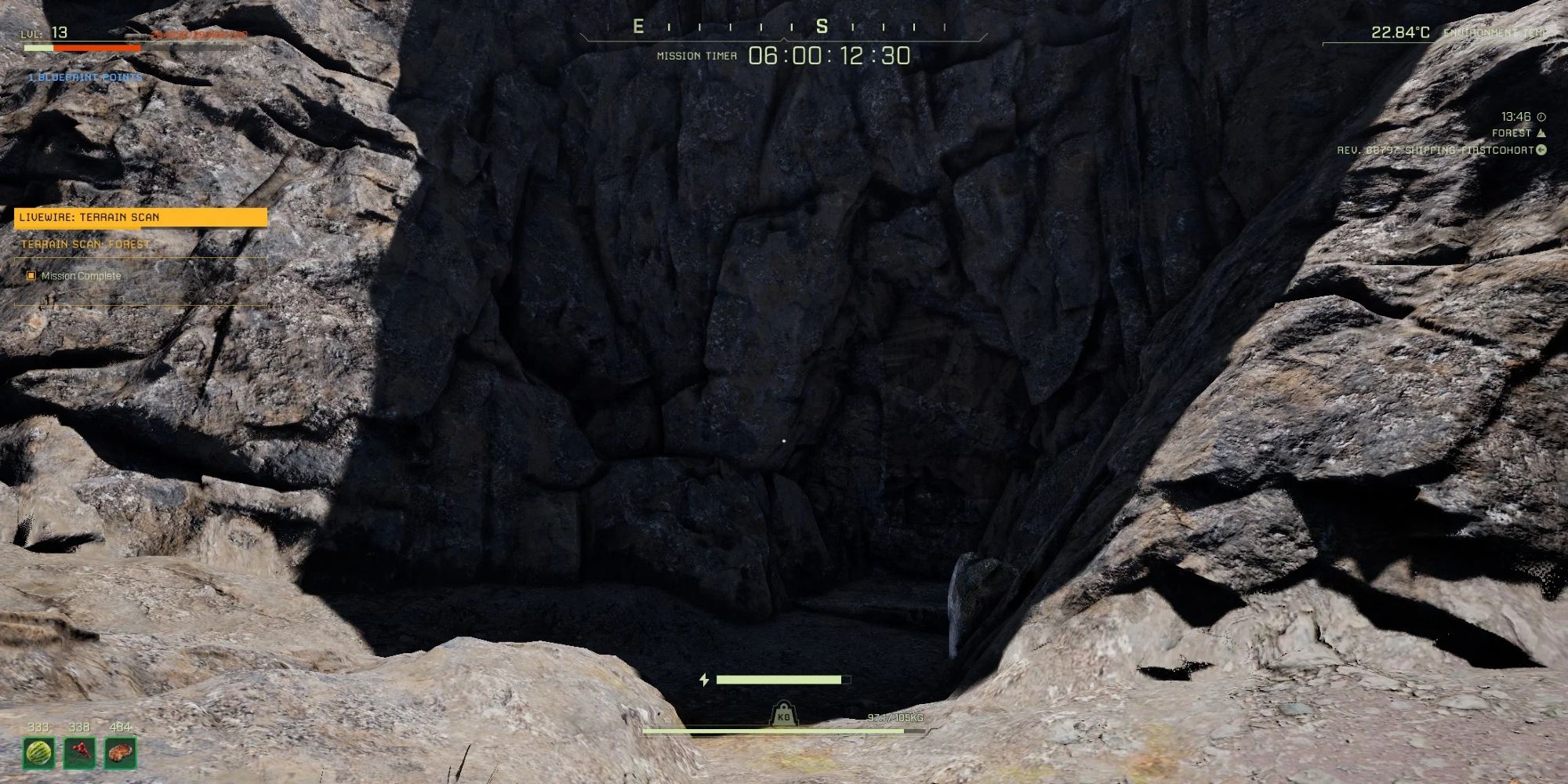 player looking at hidden cave within mountain side