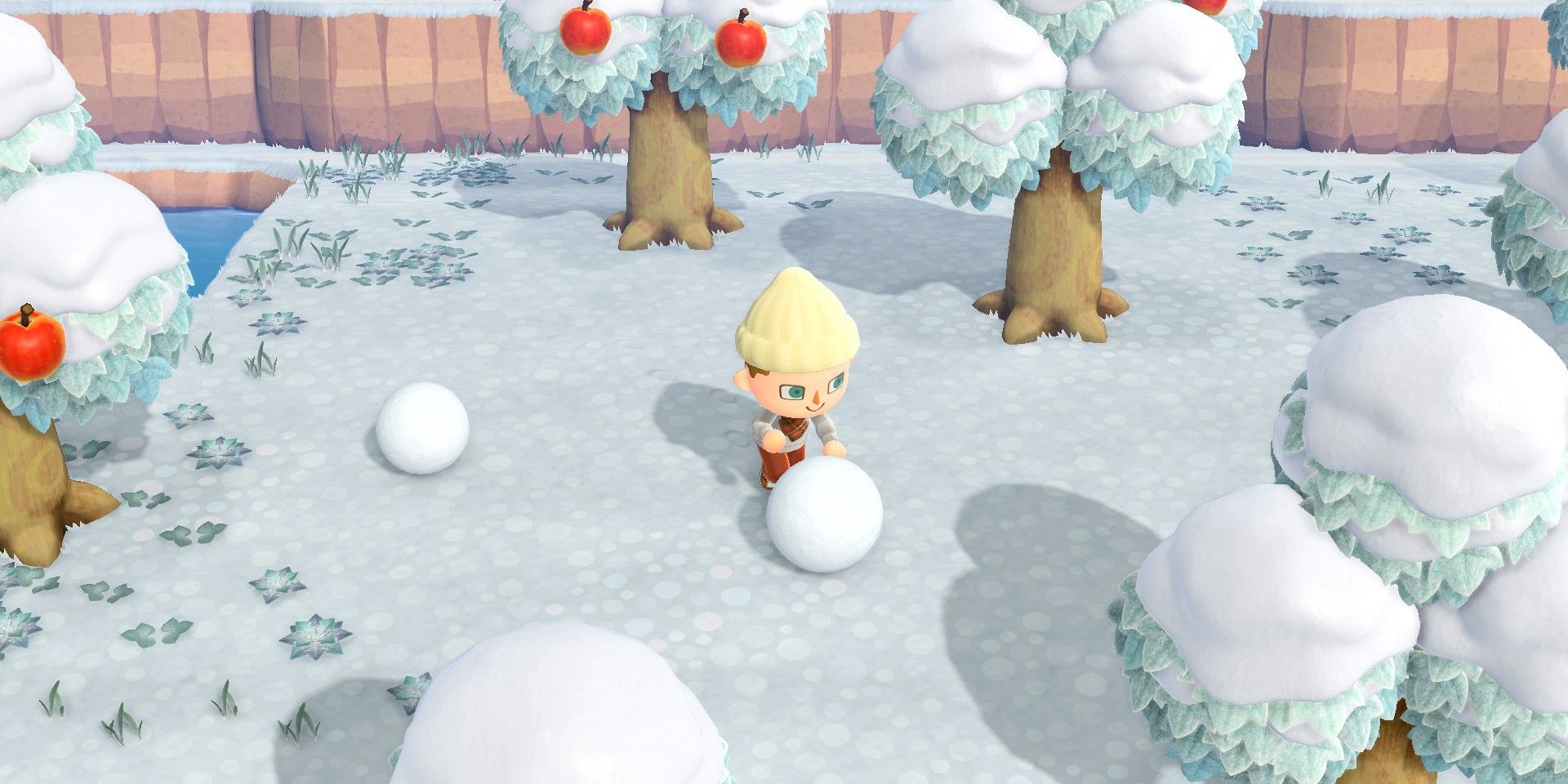 animal crossing new horizons villager rolling snowball for snowboy in winter snow