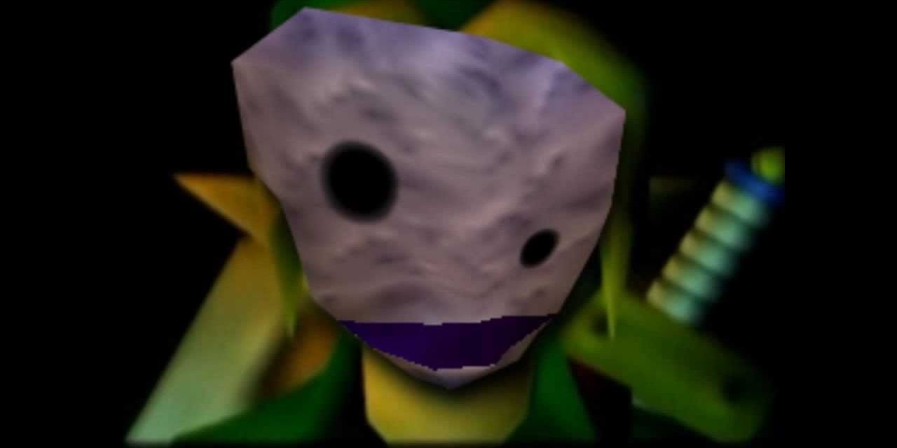 A close-up of Link wearing the Stone Mask on a black background