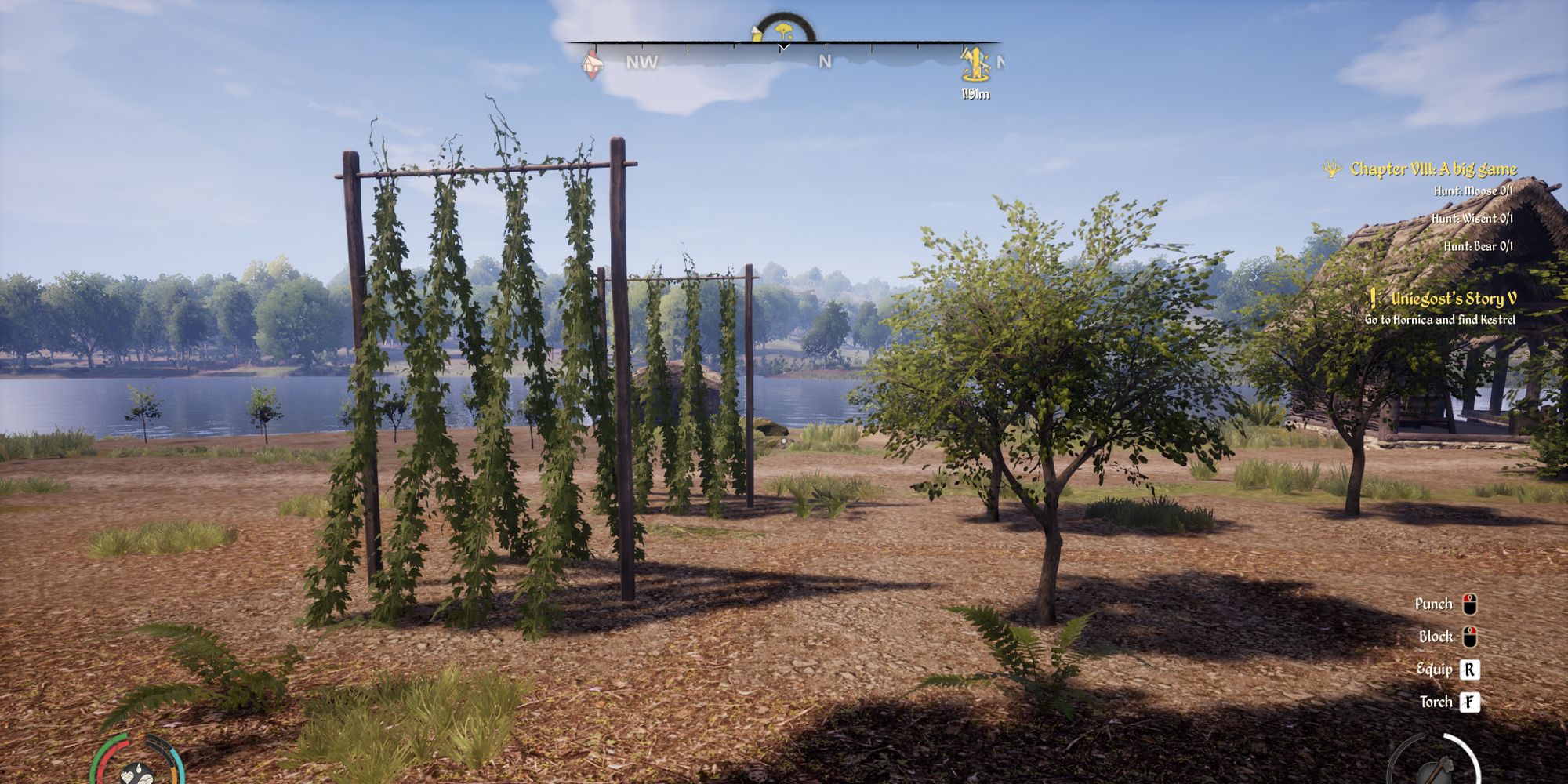 player looking towards orchard with hops and trees growing in a coastal village