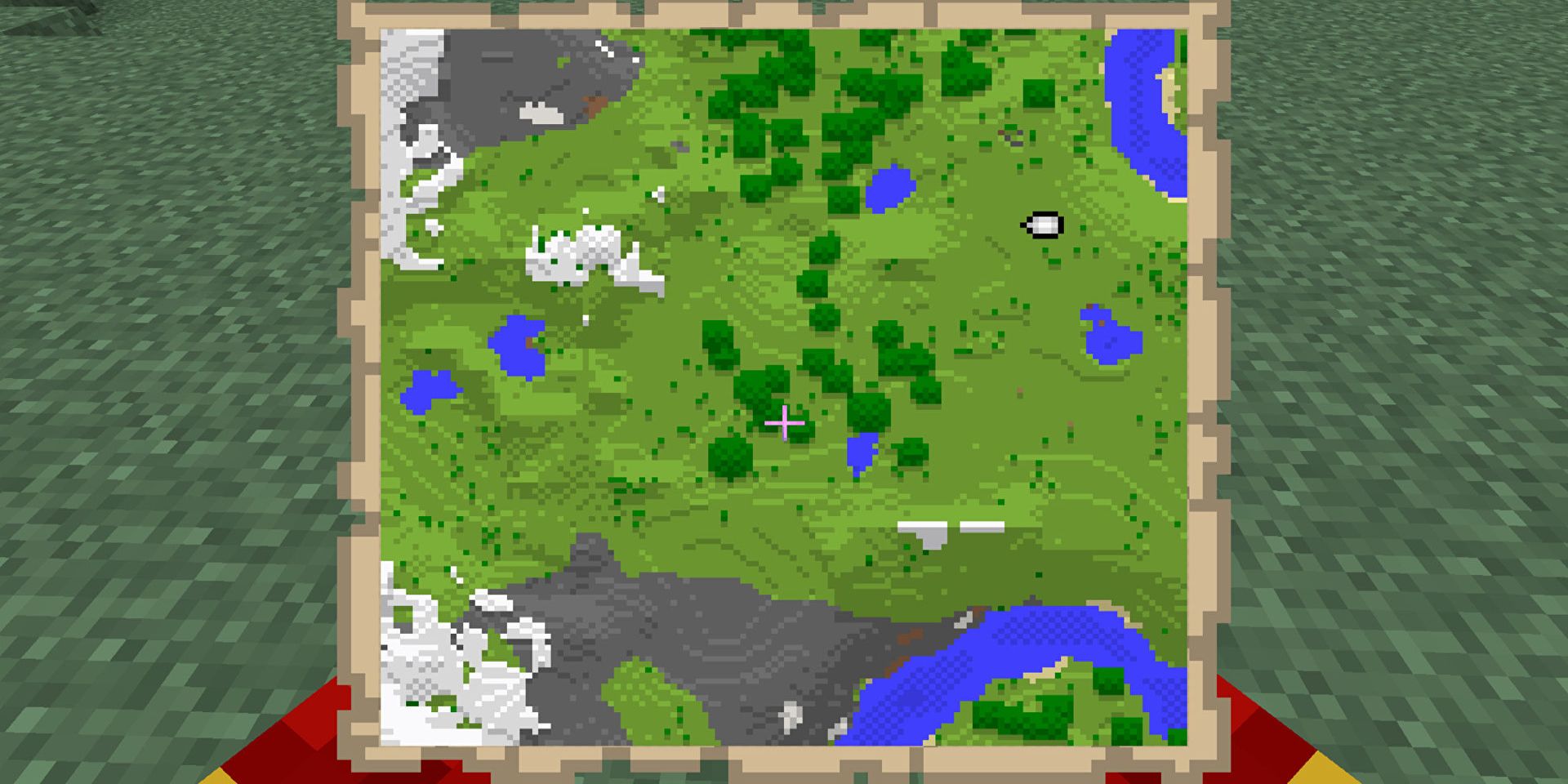 A player holding a map in Minecraft