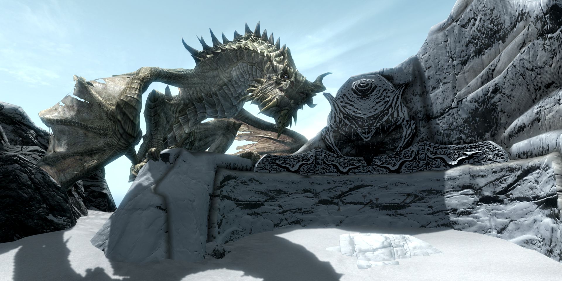 Paarthurnax perched next to a word wall at the Throat of the World in Skyrim