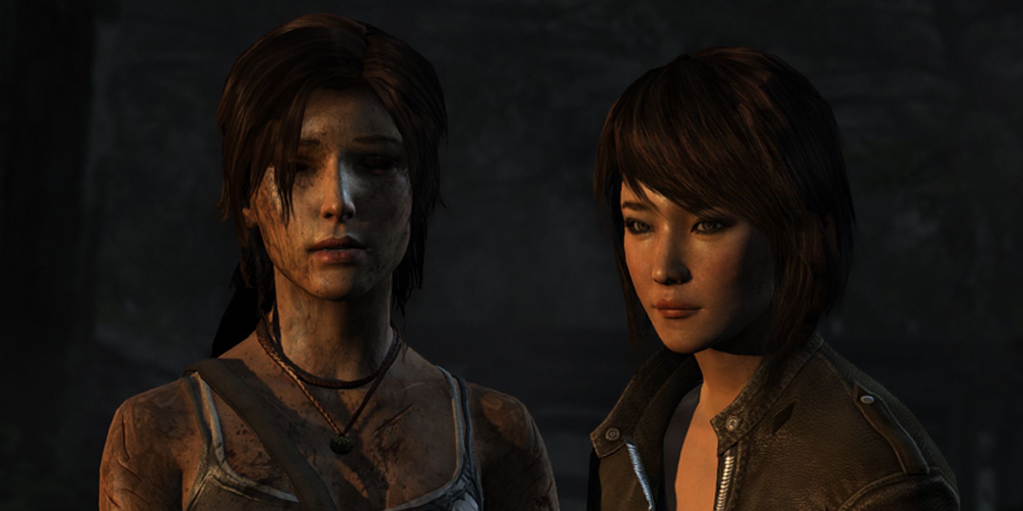 tomb raider lara and sam next to each other, looking in distance. tomb raider 2013.