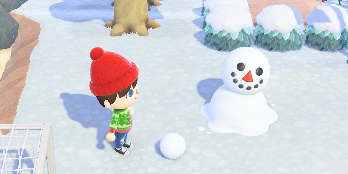 animal crossing new horizons villager with melted snowboy in winter snow