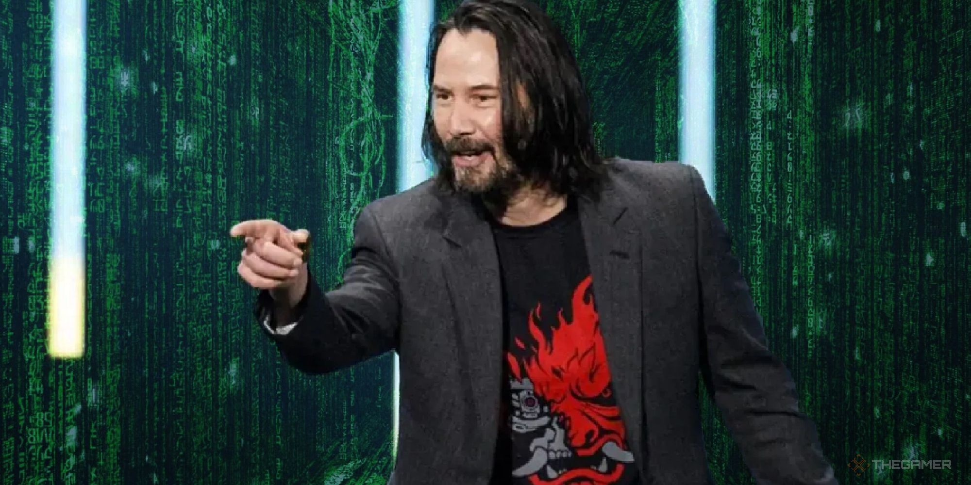 Keanu reeves at the 2020 game awards telling a fan they're breathtaking with a matrix code background behind them