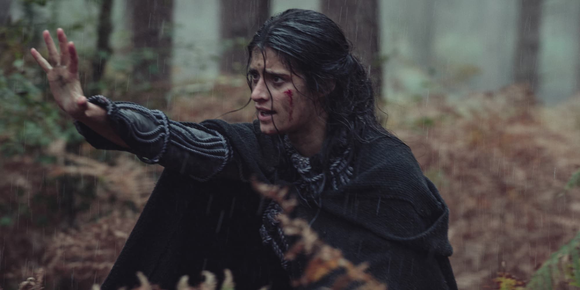 Yennefer tries to use her magic in a rainy forest