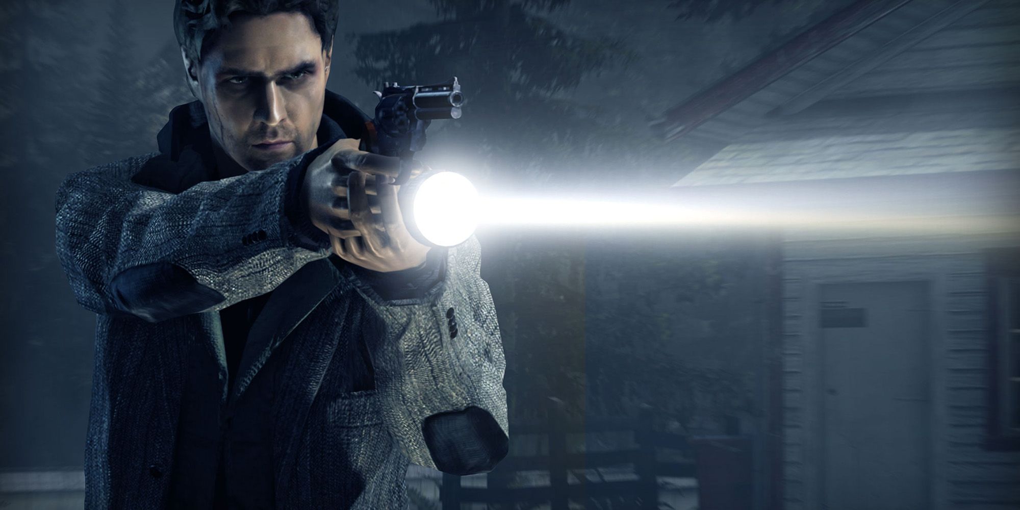 Alan Wake screen shot featuring the character with his pistol drawn